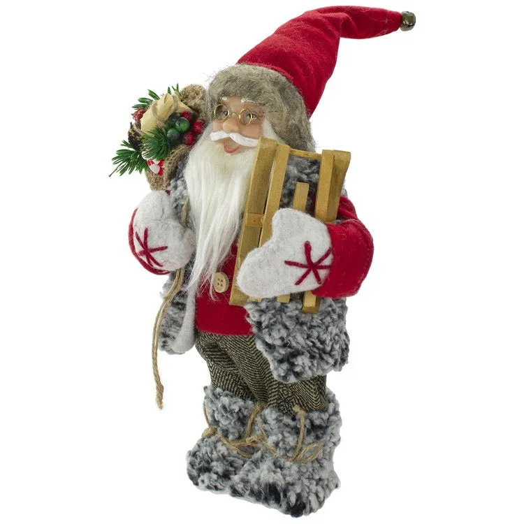 12" Standing Santa Christmas Figurine Carrying Presents and a Sled