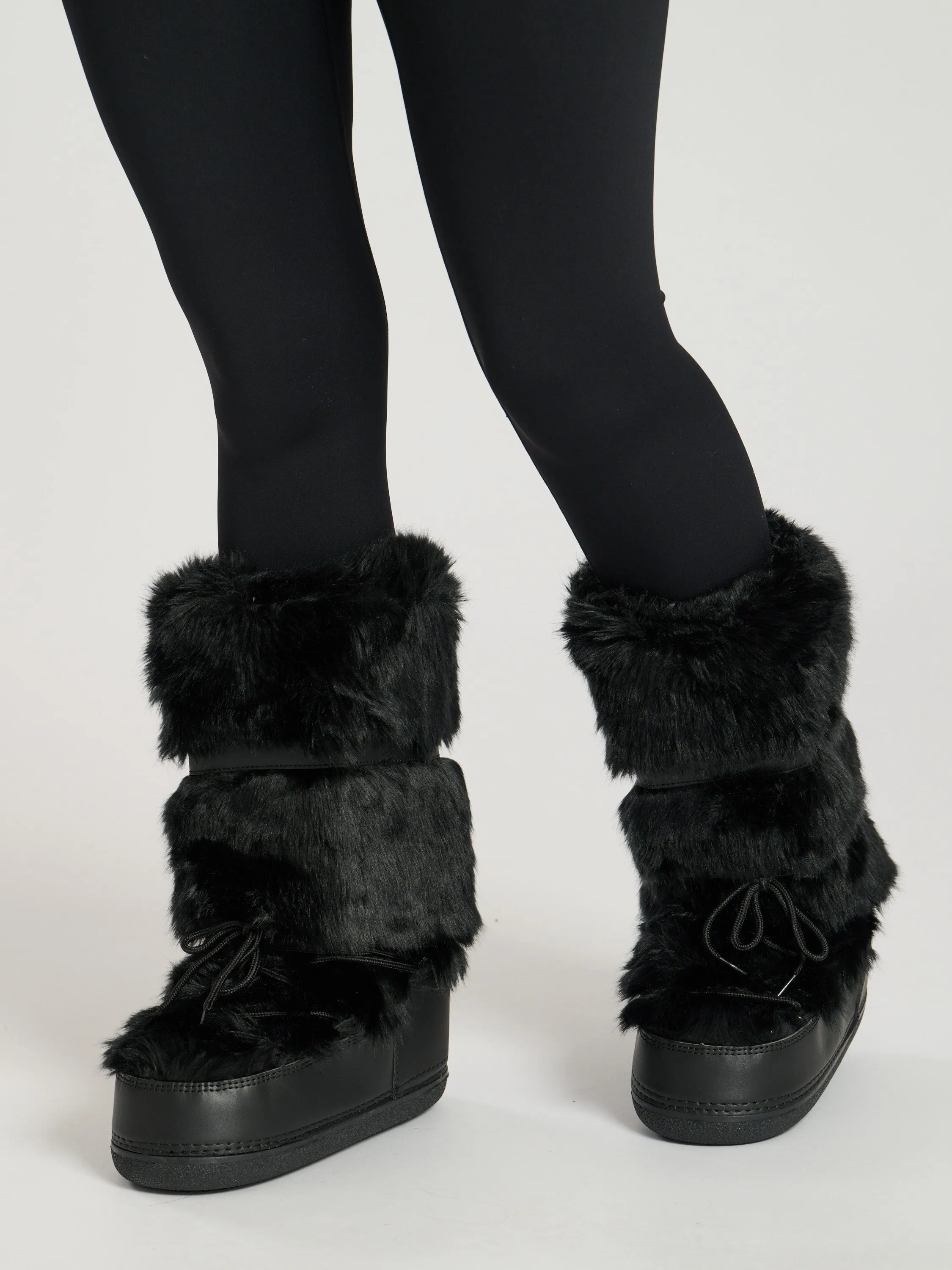 The 'Snow bunny' fluffy knee snow boots in black